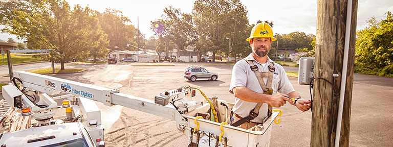 EPB Lineman working in cherry picker truck