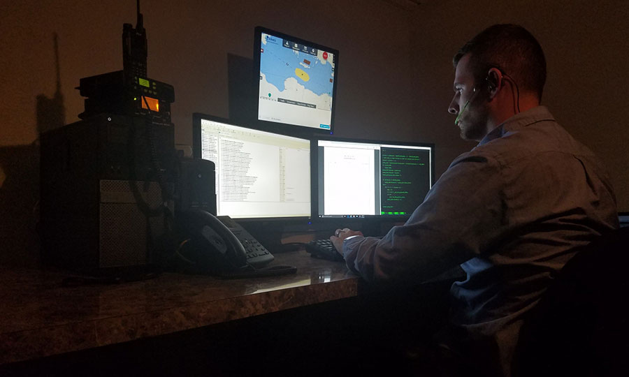 Man analyzing data on a computer monitor