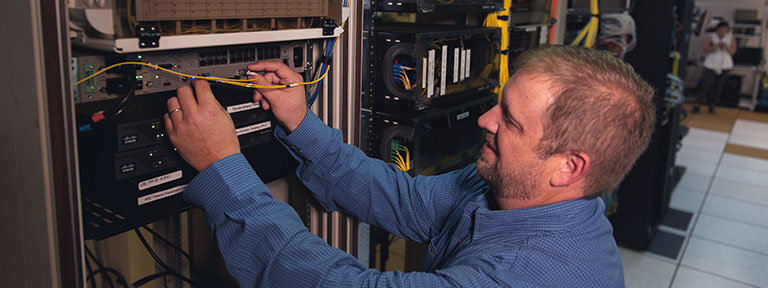 EPB employee connecting wires on a server