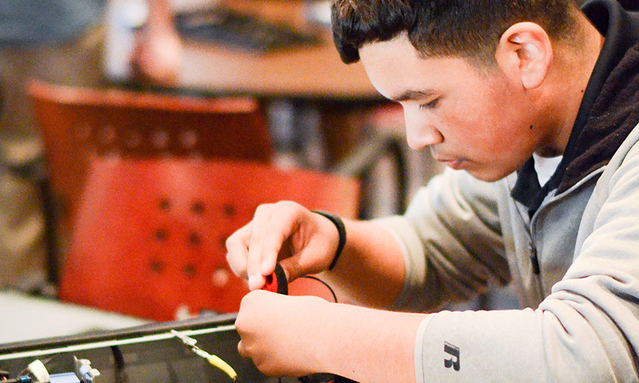 Student building a computer