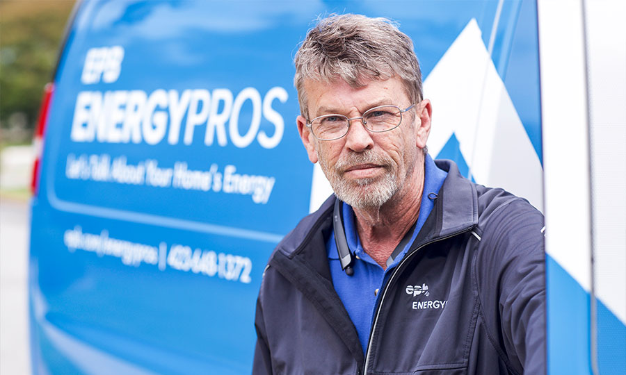 EPB Energy Pros representative posing with van