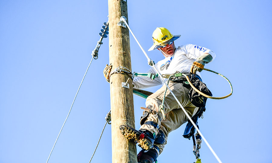 EPB Lineman climbing power pole