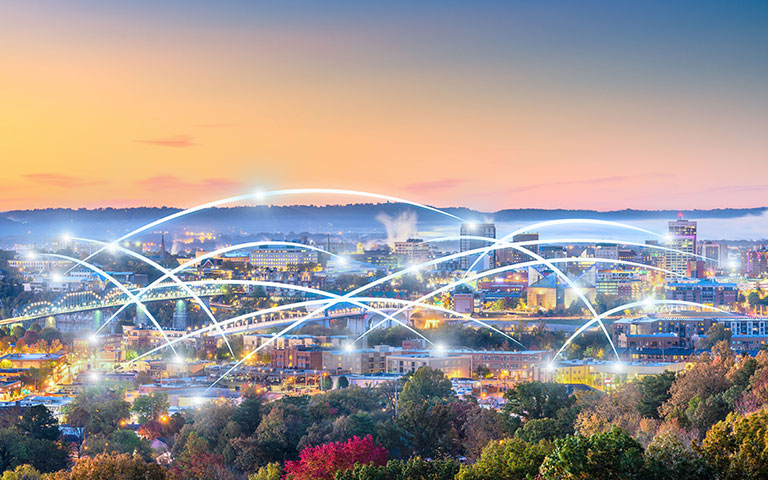 Chattanooga Skyline with illustrated fiber trails bouncing around various buildings