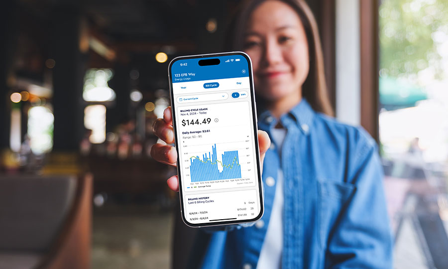 Future Ready Institute students gathered around a laptop